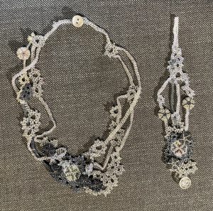 Silvery grey, organic bead woven necklace and cuff bracelet with elements of fair isle and beaded seaurchins