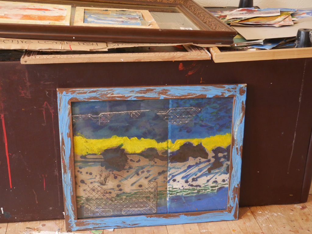 It is a painting, collage done in the early hours before daybreak. Original thoughts were around oil locked under the sea. With technology shown as a circuit board placed in the piece.