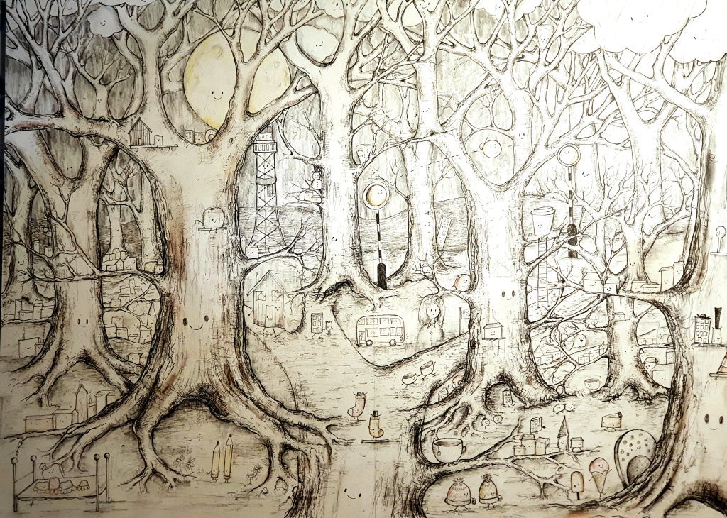 Hand drawn pen illustration of an imaginary city inside a forest. The trees are smiling and little houses, streets and buses can be seen in between them.