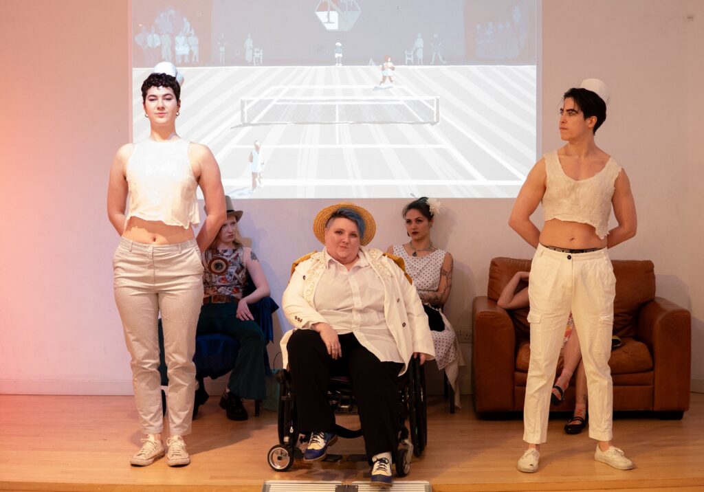 This is a pictures of some of the models at my last fashion event that I put on, with themes that criticised the British aristocracy and an all Queer/Disabled/BIPOC cast of models.